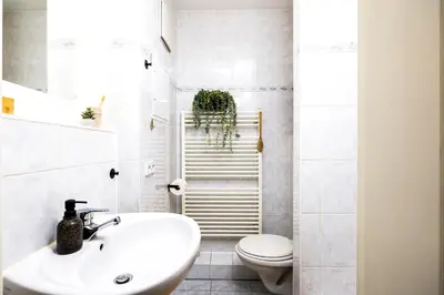 Ein Badezimmer in der Unterkunft StayTime - Honey Base