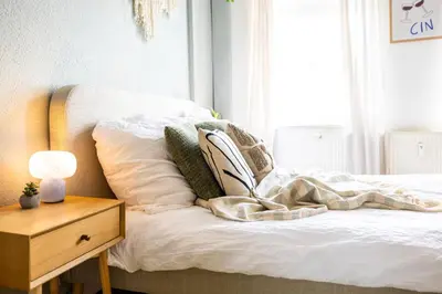 Ein Bett oder Betten in einem Zimmer der Unterkunft StayTime - Urban Base
