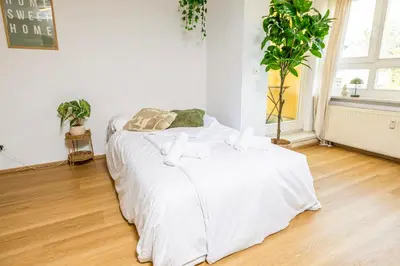 Ein Bett oder Betten in einem Zimmer der Unterkunft StayTime - Olive Nest