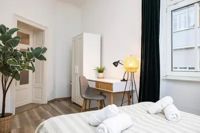 Ein Bett oder Betten in einem Zimmer der Unterkunft StayTime - Greenfield Suite