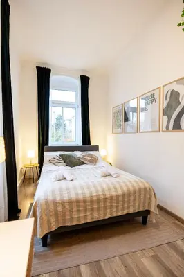 Ein Bett oder Betten in einem Zimmer der Unterkunft StayTime - Greenfield Suite