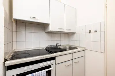 Küche/Küchenzeile in der Unterkunft StayTime - Greenfield Suite