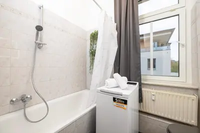 Ein Badezimmer in der Unterkunft StayTime - Greenfield Suite