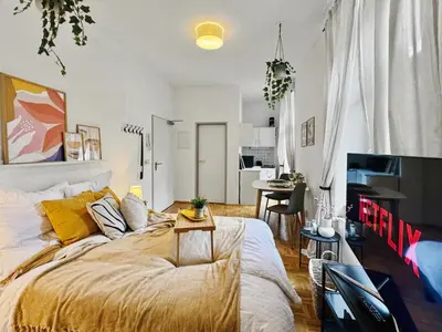 Ein Bett oder Betten in einem Zimmer der Unterkunft StayTime - Mango Room