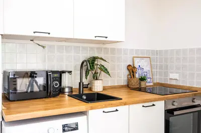Küche/Küchenzeile in der Unterkunft StayTime - Lemon Loft