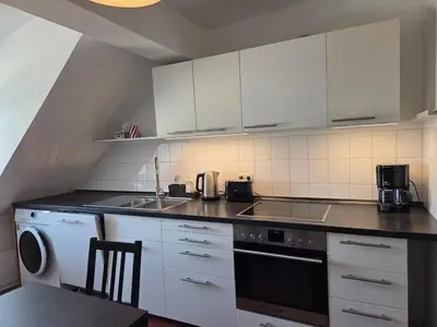 Küche/Küchenzeile in der Unterkunft Penthouse in the Neustadt