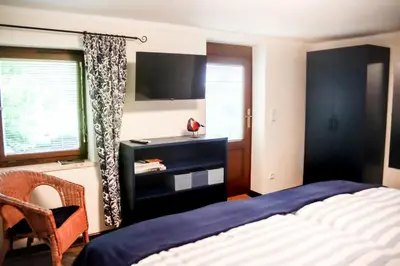 Ein Bett oder Betten in einem Zimmer der Unterkunft Waldsaumhütte mit Ausblick