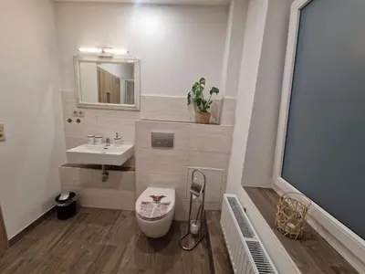 Ein Badezimmer in der Unterkunft FeWo Herzenstölen