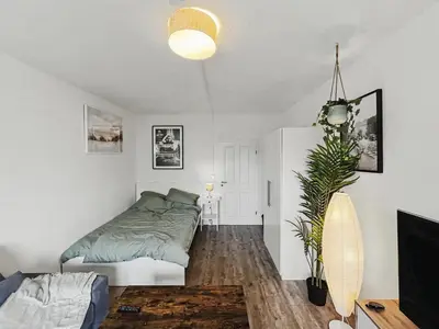 Ein Bett oder Betten in einem Zimmer der Unterkunft StayTime - Almond Room