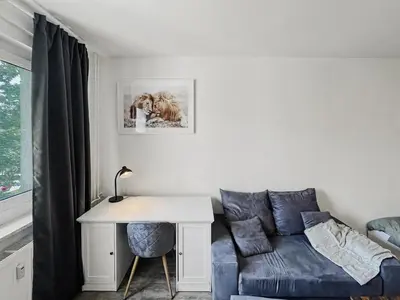 Ein Sitzbereich in der Unterkunft StayTime - Almond Room