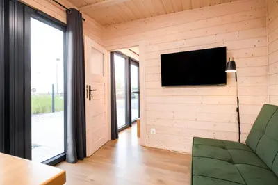 TV/Unterhaltungsangebot in der Unterkunft NORA Stays Tiny House direkt am See - Sauna - Klima