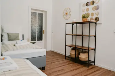 Ein Bett oder Betten in einem Zimmer der Unterkunft JINO Dresden l familienfreundlich - Küche - modern