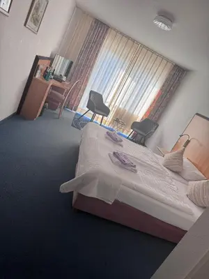 Ein Bett oder Betten in einem Zimmer der Unterkunft Hotel Torgauer Brauhof