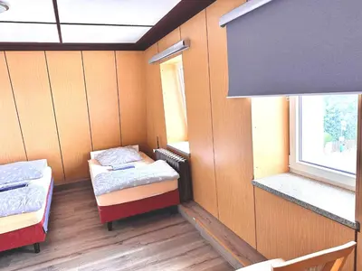Ein Bett oder Betten in einem Zimmer der Unterkunft Pension Jasmin A