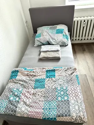 Ein Bett oder Betten in einem Zimmer der Unterkunft Pension Jasmin A