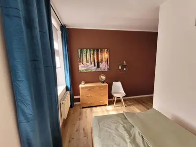 Ein Bett oder Betten in einem Zimmer der Unterkunft Schloßchemnitz No 42 Bergstr