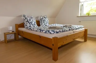 Ein Bett oder Betten in einem Zimmer der Unterkunft Ferienhaus Schöne Aussicht