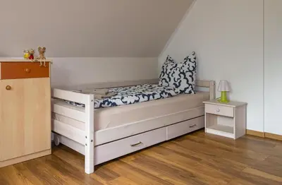 Ein Bett oder Betten in einem Zimmer der Unterkunft Ferienhaus Schöne Aussicht