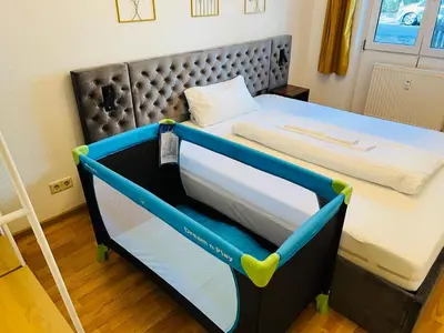 Ein Bett oder Betten in einem Zimmer der Unterkunft Boho-Apartment mit Terrasse - Ruhig & Zentrumsnah