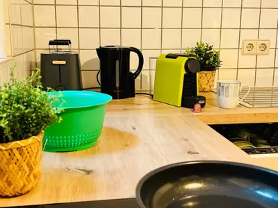 Küche/Küchenzeile in der Unterkunft Boho-Apartment mit Terrasse - Ruhig & Zentrumsnah