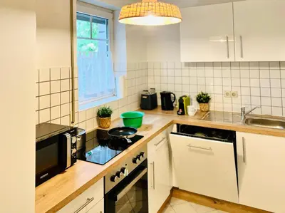 Küche/Küchenzeile in der Unterkunft Boho-Apartment mit Terrasse - Ruhig & Zentrumsnah