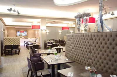 Ein Restaurant oder anderes Speiselokal in der Unterkunft Familienpark Senftenberger See