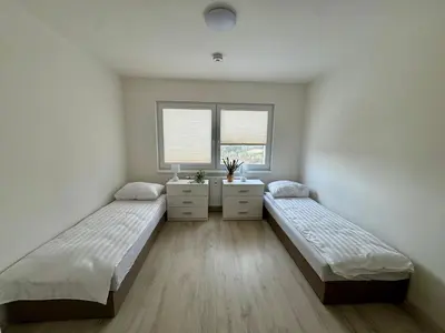 Ein Bett oder Betten in einem Zimmer der Unterkunft Apartmány Wolkenstein