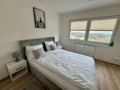 Ein Bett oder Betten in einem Zimmer der Unterkunft Apartmány Wolkenstein