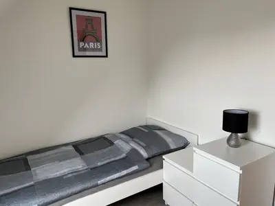 Ein Bett oder Betten in einem Zimmer der Unterkunft Comfortable apartment in Coswig
