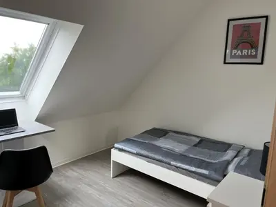 Ein Bett oder Betten in einem Zimmer der Unterkunft Comfortable apartment in Coswig