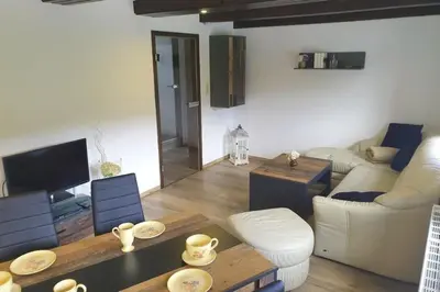 Ein Sitzbereich in der Unterkunft Elbblick kleine Wohnung