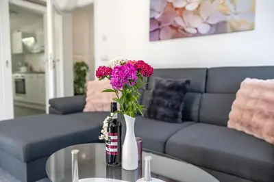 Ein Sitzbereich in der Unterkunft Ferienwohnung An der Rennbahn