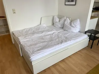Ein Bett oder Betten in einem Zimmer der Unterkunft Modern, large 1-R apartment in a central location