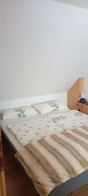 Ein Bett oder Betten in einem Zimmer der Unterkunft Ferienwohnung Waldblick in Frauenstein
