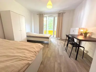 Ein Bett oder Betten in einem Zimmer der Unterkunft AIKey Chemnitz 233
