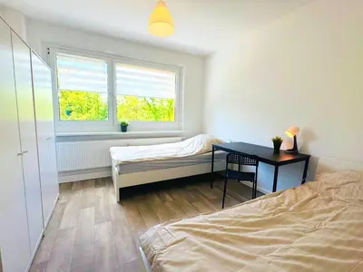 Ein Bett oder Betten in einem Zimmer der Unterkunft AIKey Chemnitz 233