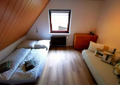 Ein Bett oder Betten in einem Zimmer der Unterkunft Ferienhaus am Röhrensteig