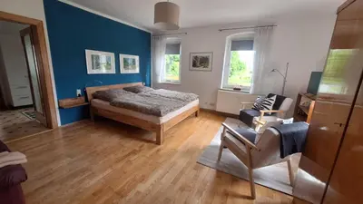Ein Bett oder Betten in einem Zimmer der Unterkunft Atelier-FEWO-Polenztal