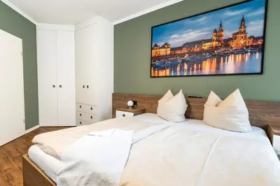 Ein Bett oder Betten in einem Zimmer der Unterkunft City Apartment Riesa