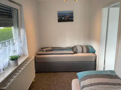 Ein Bett oder Betten in einem Zimmer der Unterkunft Eastside - Apartment WHG 02