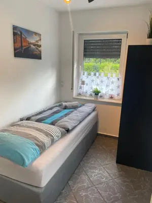 Ein Bett oder Betten in einem Zimmer der Unterkunft Eastside - Apartment WHG 02