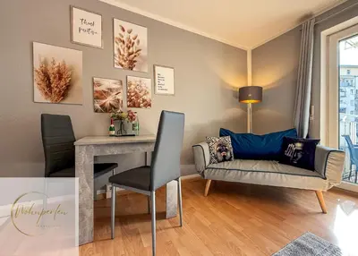 Ein Sitzbereich in der Unterkunft Apartment - NewTown - Balkon