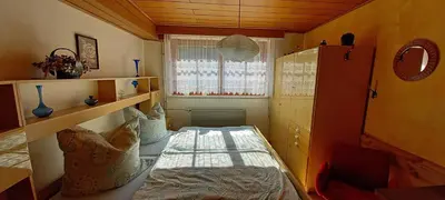 Ein Bett oder Betten in einem Zimmer der Unterkunft Gästezimmer Morgenstern
