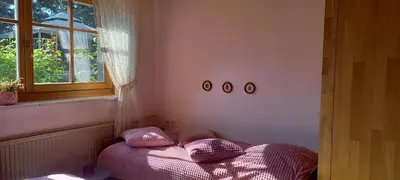 Ein Bett oder Betten in einem Zimmer der Unterkunft Gästezimmer Morgenstern