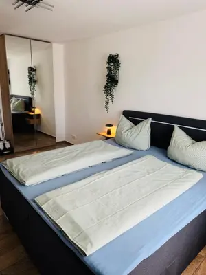 Ein Bett oder Betten in einem Zimmer der Unterkunft Zentraler Moment
