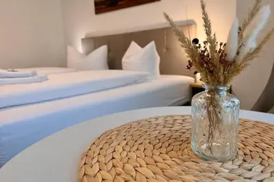 Ein Bett oder Betten in einem Zimmer der Unterkunft DH Hotel Deutsches Haus Mittweida - Ihr digitales Hotel