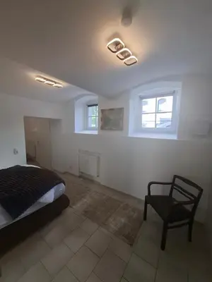Ein Bett oder Betten in einem Zimmer der Unterkunft Holiday Flat Le jardin