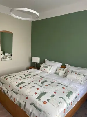 Ein Bett oder Betten in einem Zimmer der Unterkunft Neue Ferienwohnung mit Terrasse