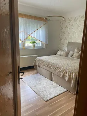 Ein Bett oder Betten in einem Zimmer der Unterkunft Neue Ferienwohnung mit Terrasse