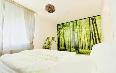 Ein Bett oder Betten in einem Zimmer der Unterkunft Zentrale Wohlfühloase